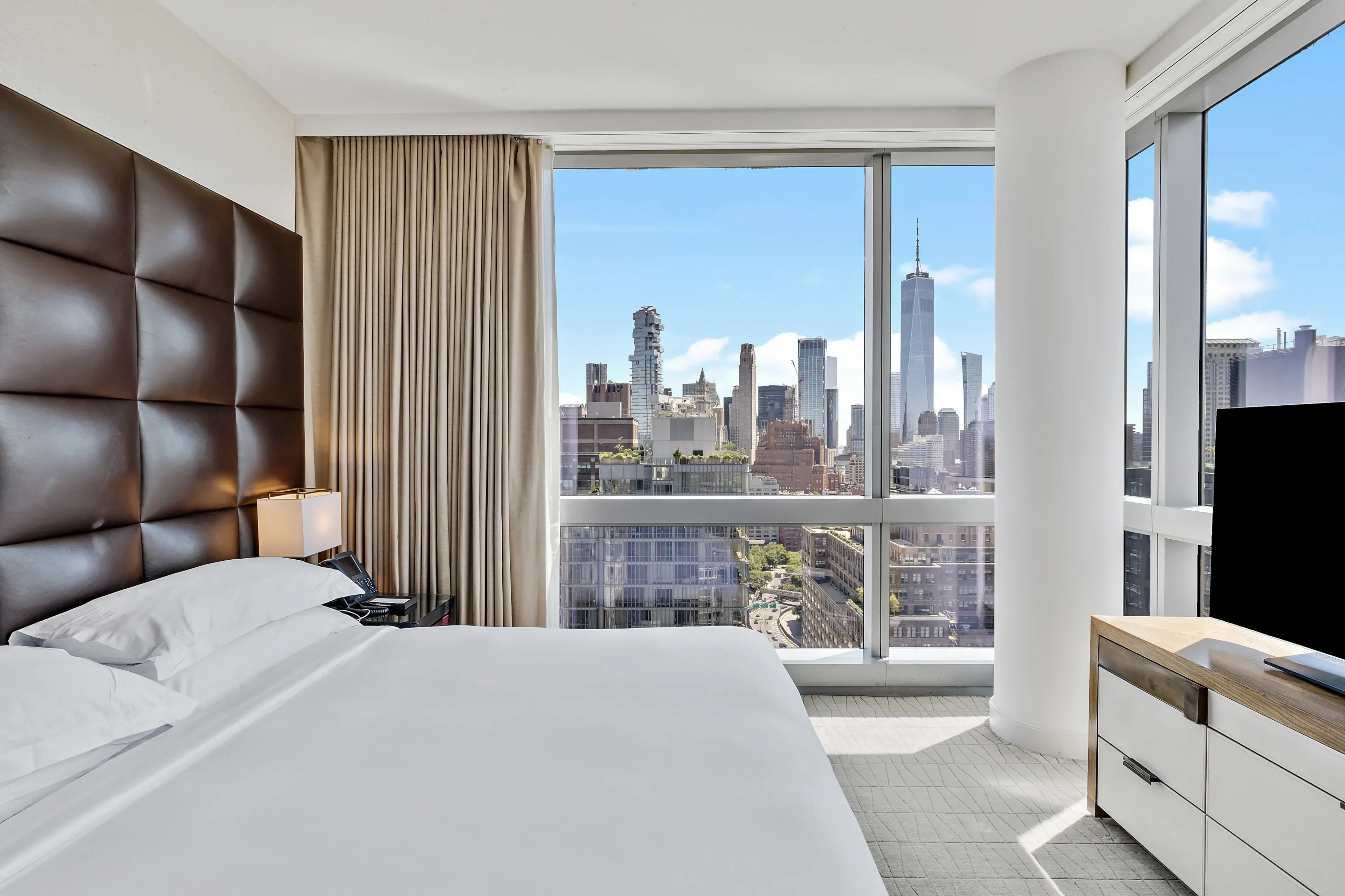 Manhattan, New York City, USA - 06-20-22 - Corner "SoHi Suite" at the Five Diamond Luxury SoHo-based hotel, The Dominick, with sweeping views of Manhattan and The Hudson River